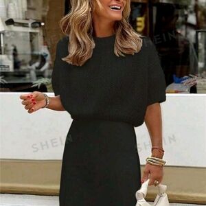 Short sleeve knitted sweater with round neck. Small cropped. Black sweater top